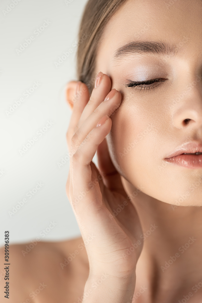 beautiful naked tender girl posing isolated on white