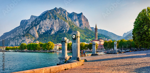 Amazing summer scene of Como lake. Wonderful morning cityscape of central park of Lecco town, Italy, Europe. Traveling concept background.