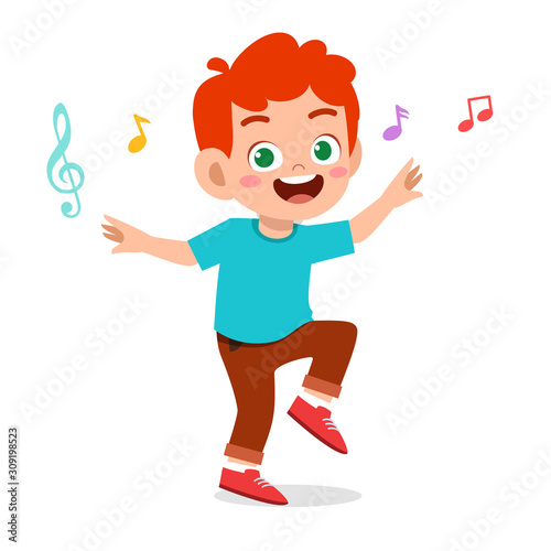 happy cute kid boy dance with music