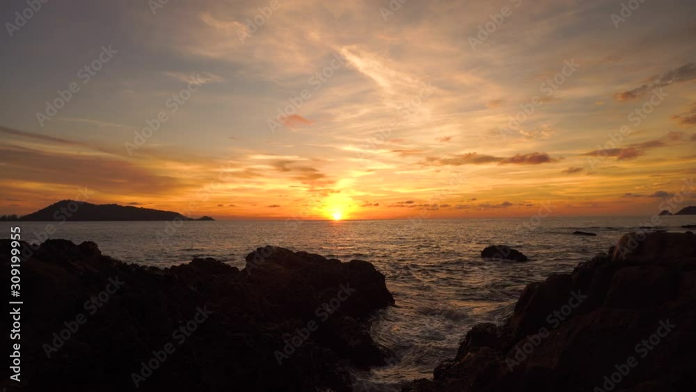 Beautiful tropical beach with sunset sky and white cloud background. Summer vacation and nature environment concept. Beautiful tropical beach with sunset sky and white cloud background. Summer vacation and nature environment concept.