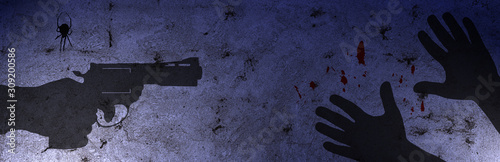 Shadows of a hand with gun and hands of murdered person against concrete wall with blood stains in the darkness photo