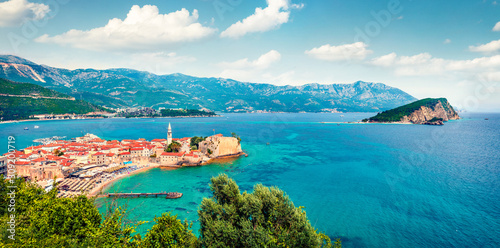 One of the most attractive city of Montenegro - Budva, old medieval town on the coast of Adriatic sea. Aerial summer panorama of Mediterranean countries. Traveling concept background.