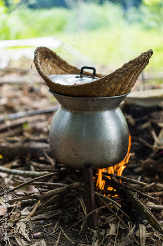 outdoor cooking Thai old kettle on fire