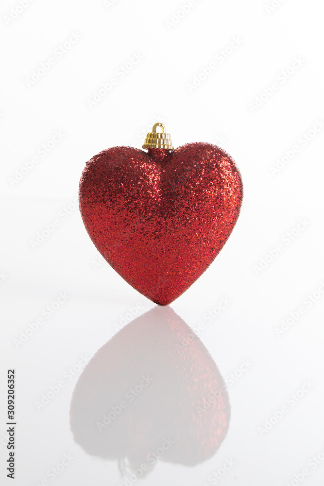Red Christmas decoration with a shape of a heart Red Christmas decoration with a shape of a heart