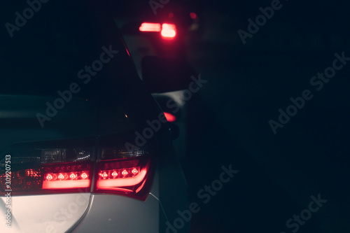 Blurred images of light traffic on the night road.