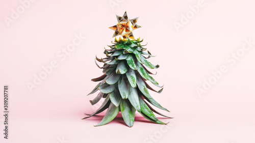 Pineapple leaves in the form of a Christmas tree with decorations. Creative christmas concept. 2020 year