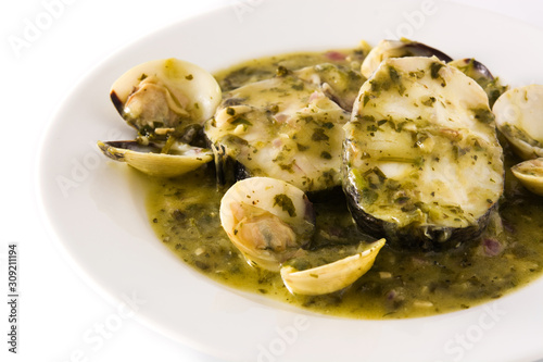 Hake fish and clams with green sauce. Typical spanish recipe. Close up 