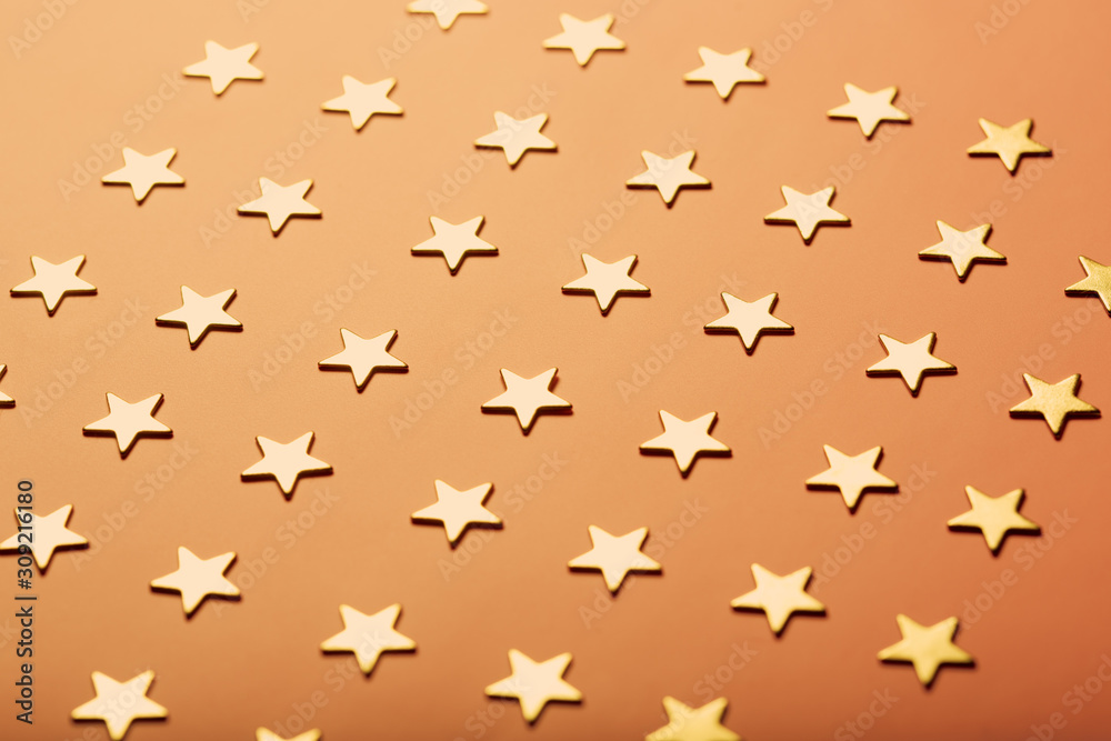 Pinky holiday background with golden stars Pinky holiday background with golden stars