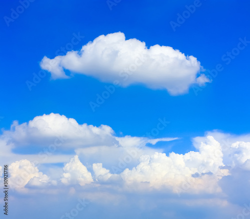 Clear Blue Sky with Fluffy Cloud