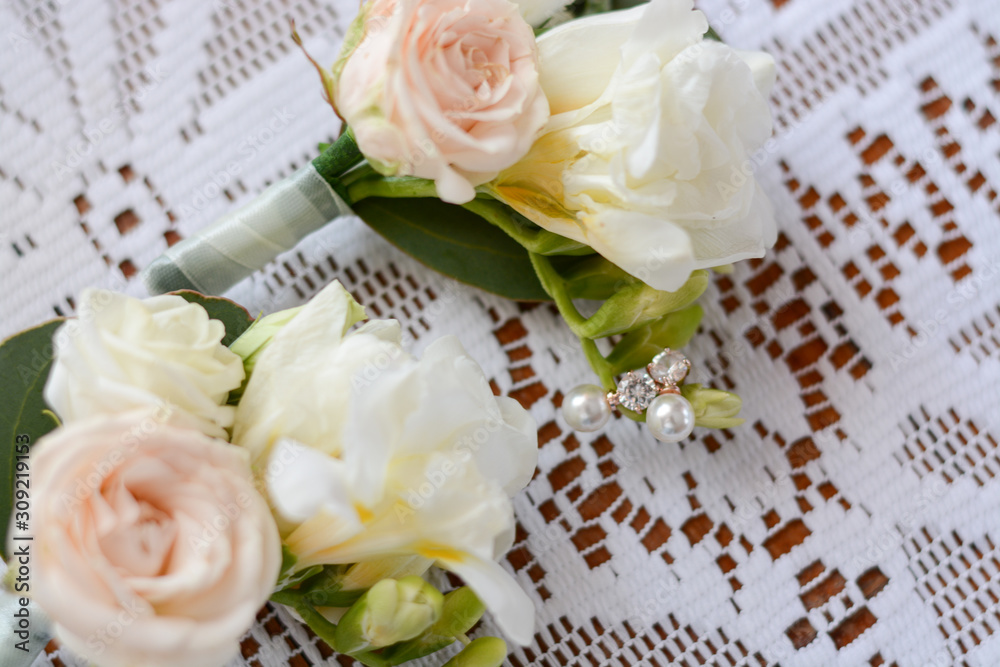 wedding bouquet of flowers in the hands of the bride wedding bouquet of flowers in the hands of the bride