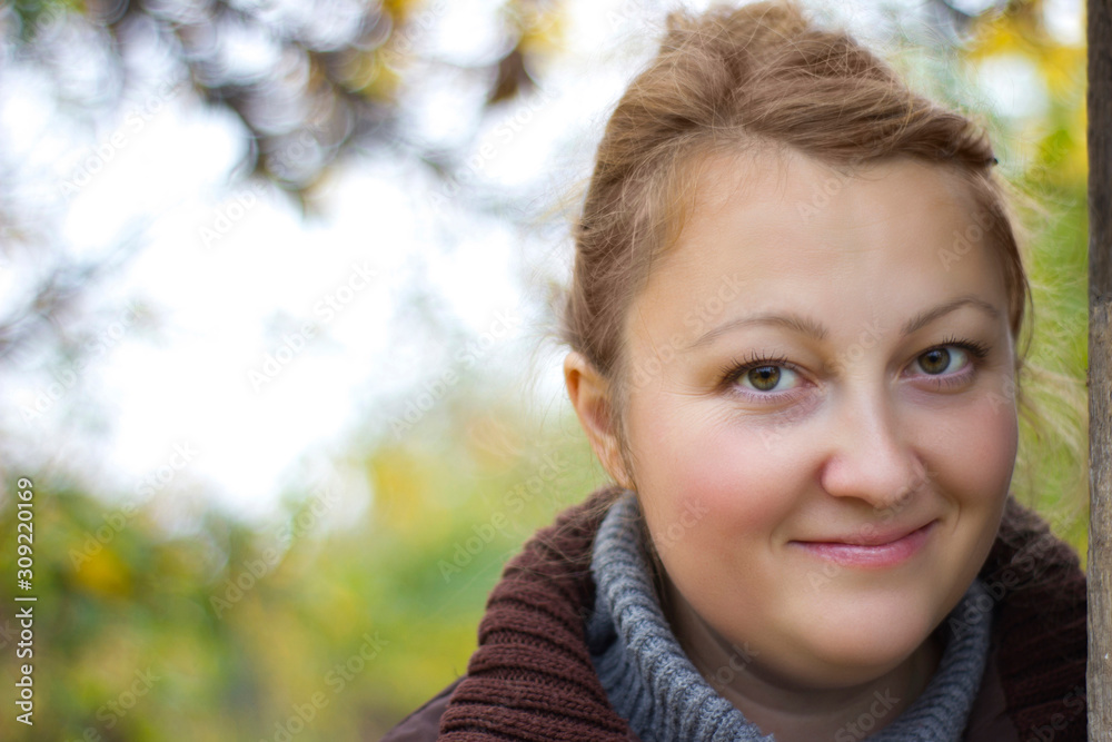 Portrait young beautiful girl on background autumn leaves - closeup, outdoors Portrait young beautiful girl on background autumn leaves - closeup, outdoors