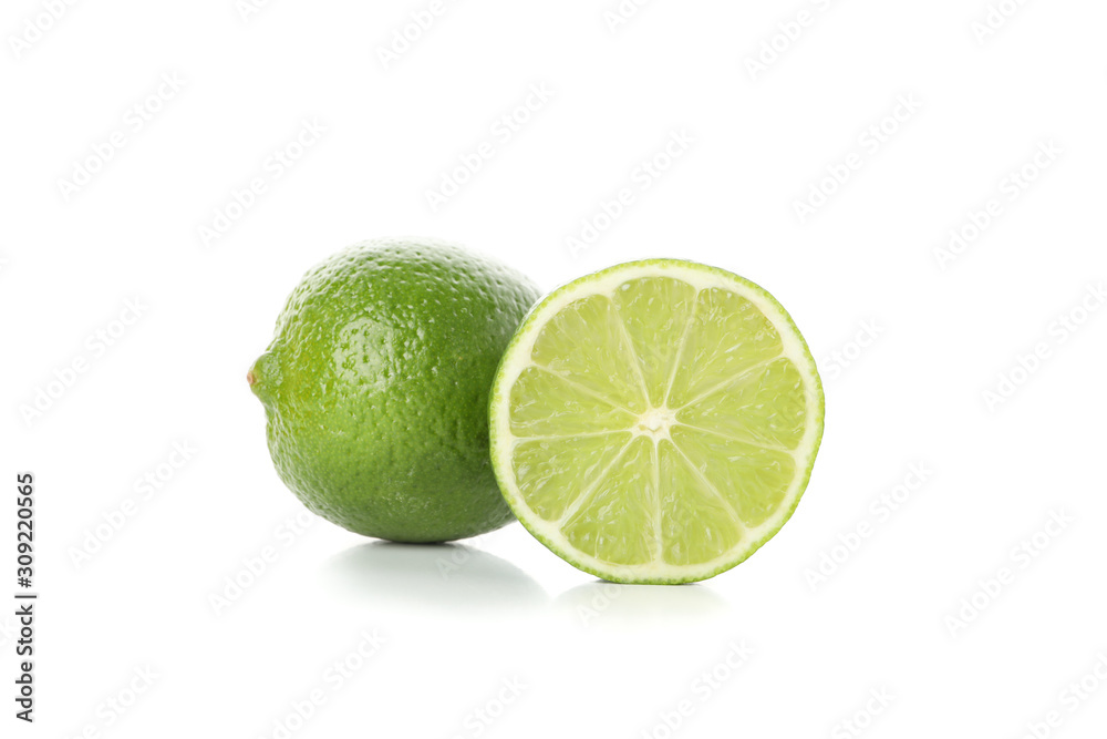 Fresh limes isolated on white background, close up Fresh limes isolated on white background, close up