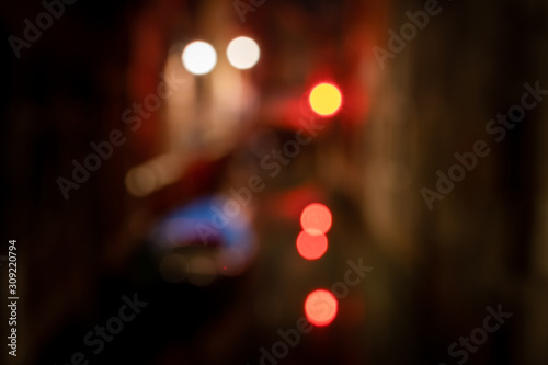 blurred lights on a water canal in Venice 