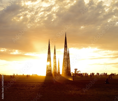 sunset over structure in desert