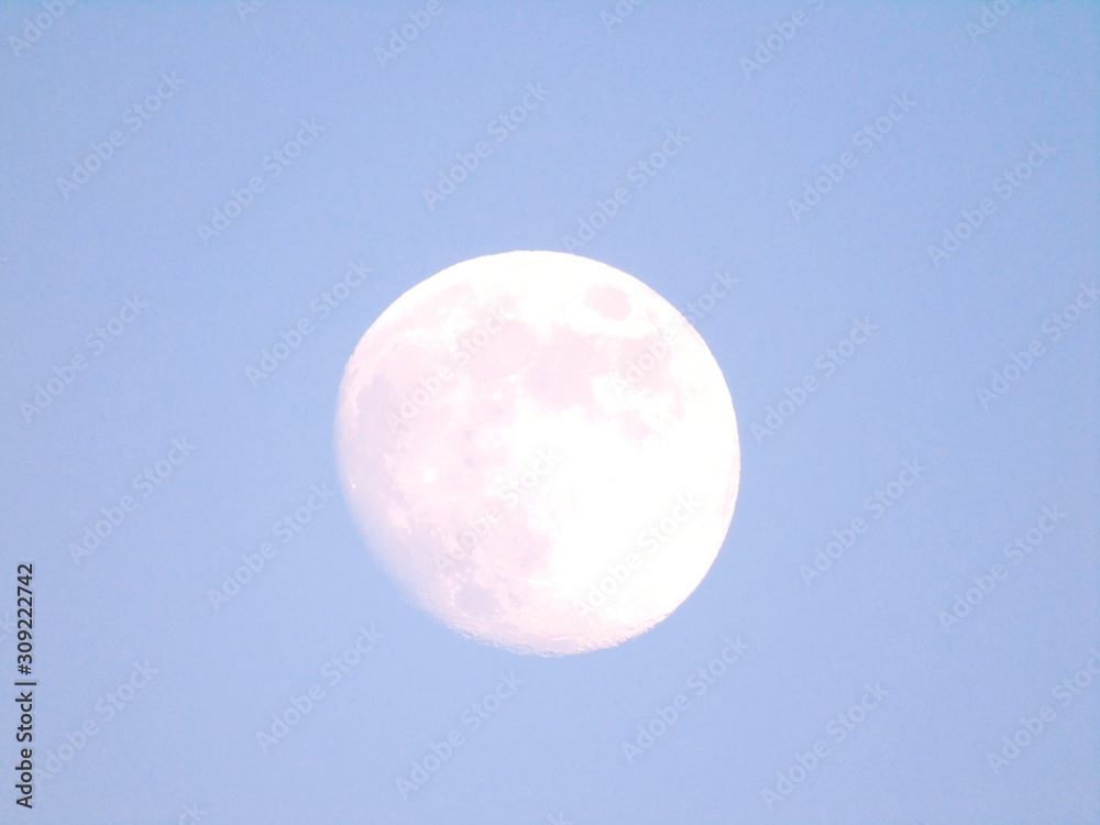 Beautiful caption of the moonlight by day with an incredible blue sky in the background. Beautiful caption of the moonlight by day with an incredible blue sky in the background.