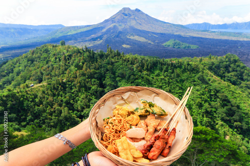 Balinese food with volcano view, Kintamani, Bali photo