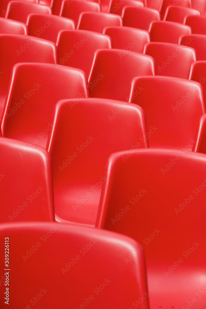 Fototapeta premium Red plastic chairs