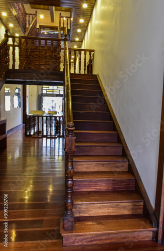 Old classic wooden staircase in entrance hall