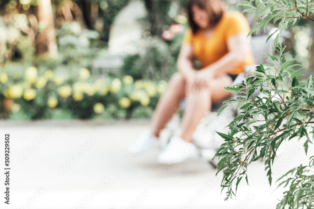 Blur images of fat woman are Patients sitting on a wheelchair She Have