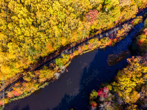 Fototapeta Naklejka Na Ścianę i Meble -  Aerial Photo Taken in New England During Peak Foliage in the Autumn Season