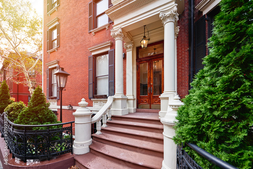 A view of a historic brownstone building in an iconic neighborhood of Manhattan, New York City