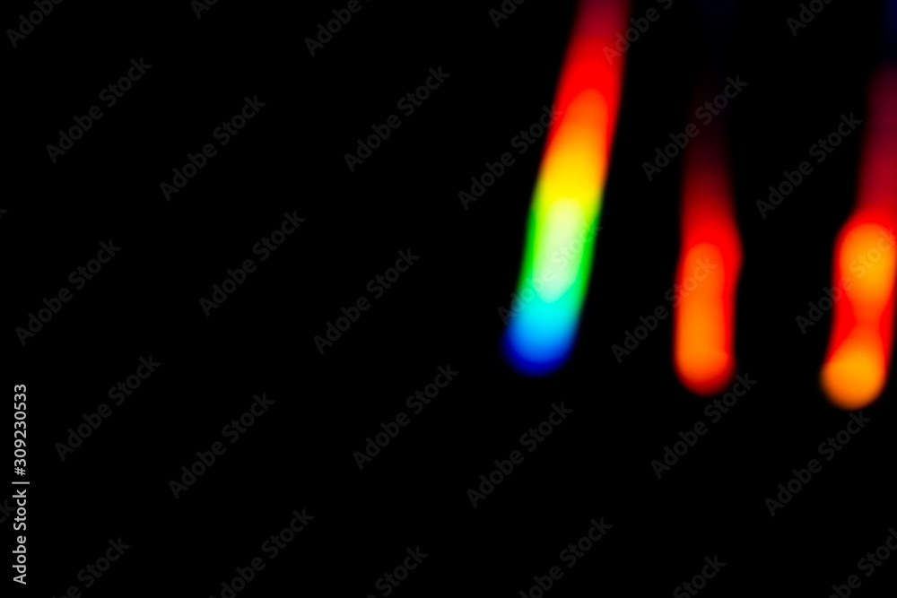 Holographic background with different colors. Holographic lines on black background. Neon line. overlay layer. Holographic background with different colors. Holographic lines on black background. Neon line. overlay layer.