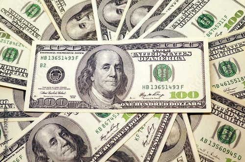 Obraz na płótnie One hundred dollar banknotes background. w salonie