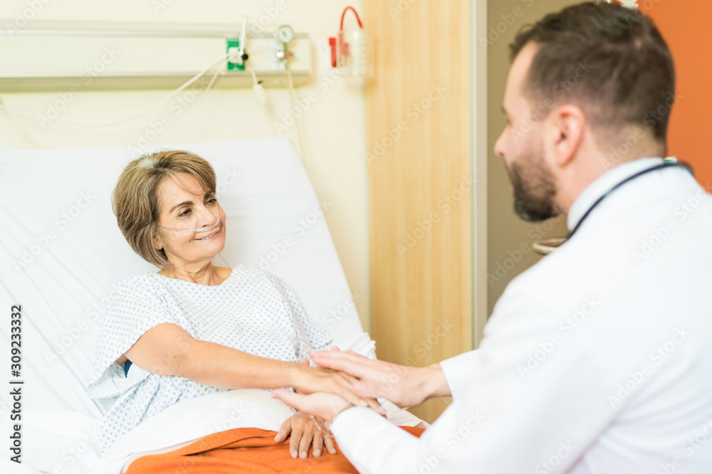 Fototapeta premium Elderly Patient Has Trust On Doctor In Hospital