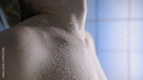 Droplets on wet skin of neck collarbone breast and shoulder photo