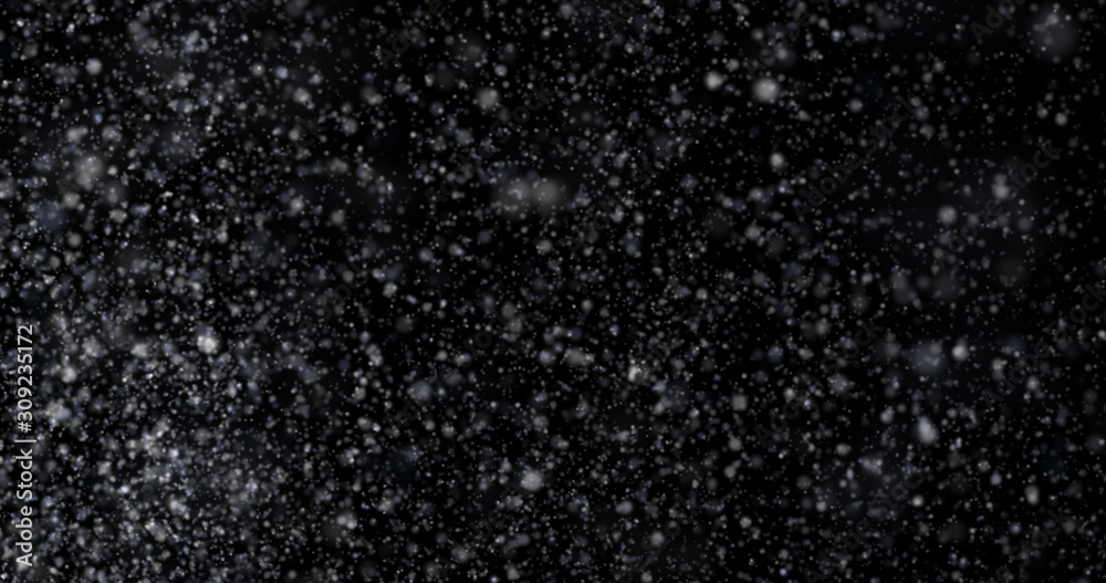 Natural white winter snowfall on a black background Natural white winter snowfall on a black background