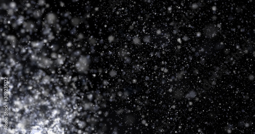Natural white winter snowfall on a black background © Yuriy