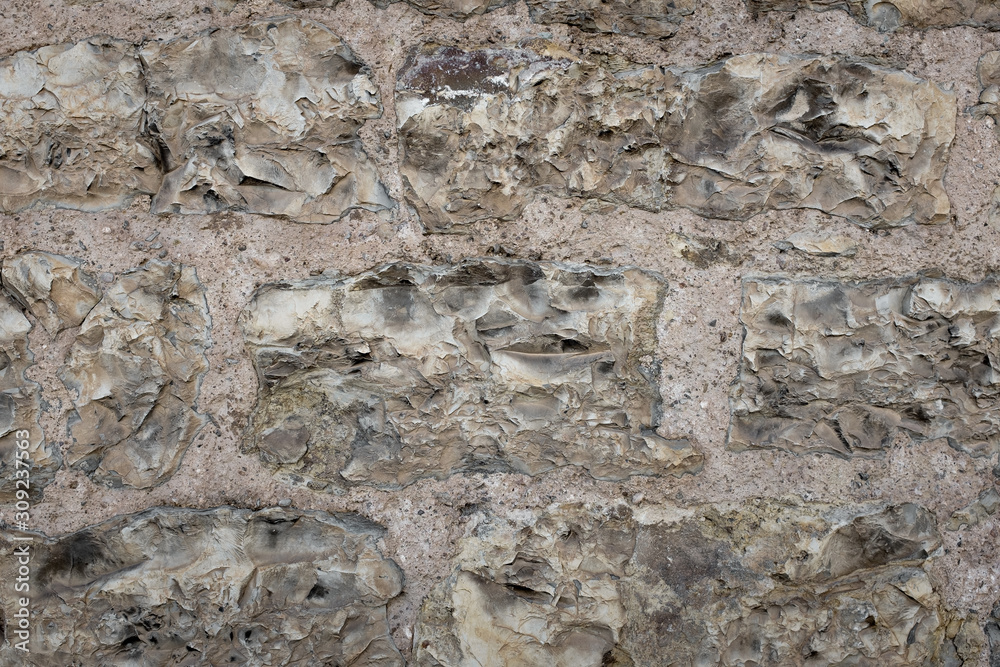 Wall built with stone and cement mortar or lime Wall built with stone and cement mortar or lime