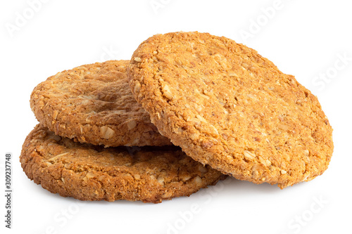 Foto Three crunchy oat and wholemeal biscuits isolated on white.