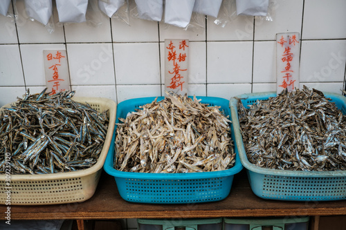 Canvas Print dried fishes, dry fish on fish market, Hongkong, China  -