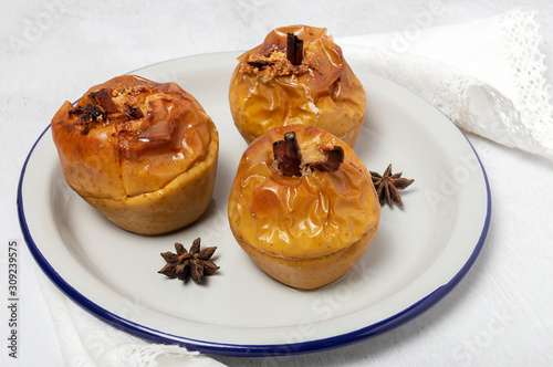 Homemade roasted apples on white background