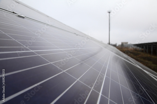 Sunlight gleams off solar panel. Solar panel produces green, environmentally friendly energy from the sun. © Master Video