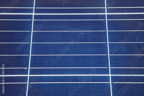 Sunlight gleams off solar panel. Solar panel produces green, environmentally friendly energy from the sun.