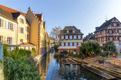 Traditional Alsatian half-timbered houses and river Lauch in Petite Venise or little Venice, old town of Colmar, decorated and illuminated at christmas time, Alsace, France © Alfredo