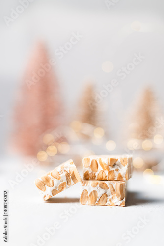 almond nougat closeup with bokeh christmas