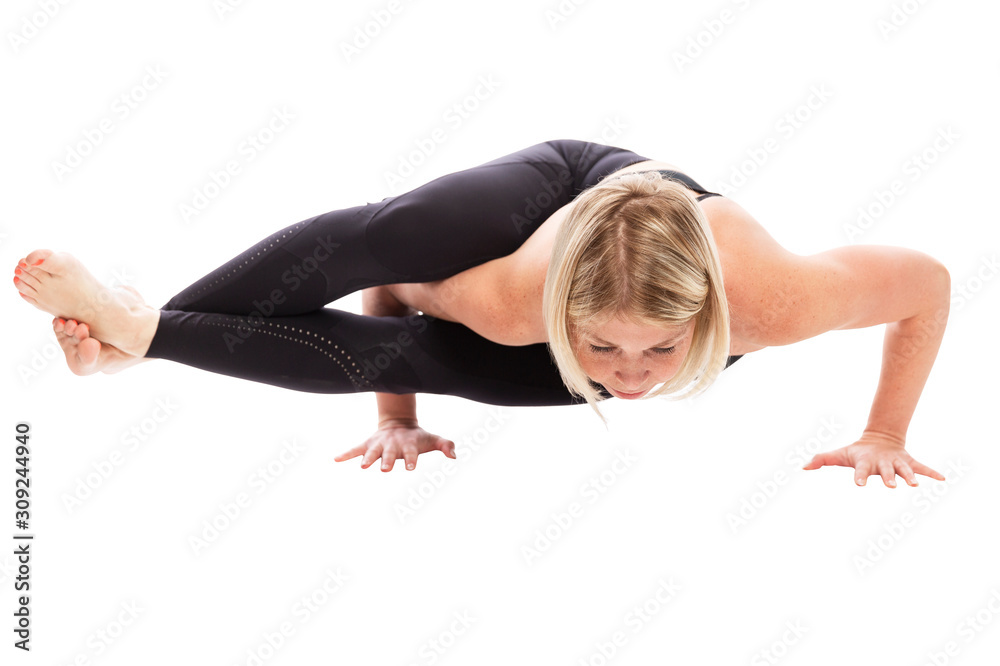 Young woman in black sportswear in yoga pose. Healthy lifestyle. Isolated over white background. Young woman in black sportswear in yoga pose. Healthy lifestyle. Isolated over white background.