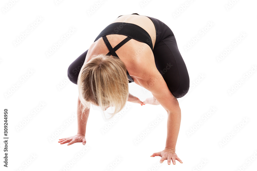 Young woman in black sportswear in yoga pose. Healthy lifestyle. Isolated over white background. Young woman in black sportswear in yoga pose. Healthy lifestyle. Isolated over white background.