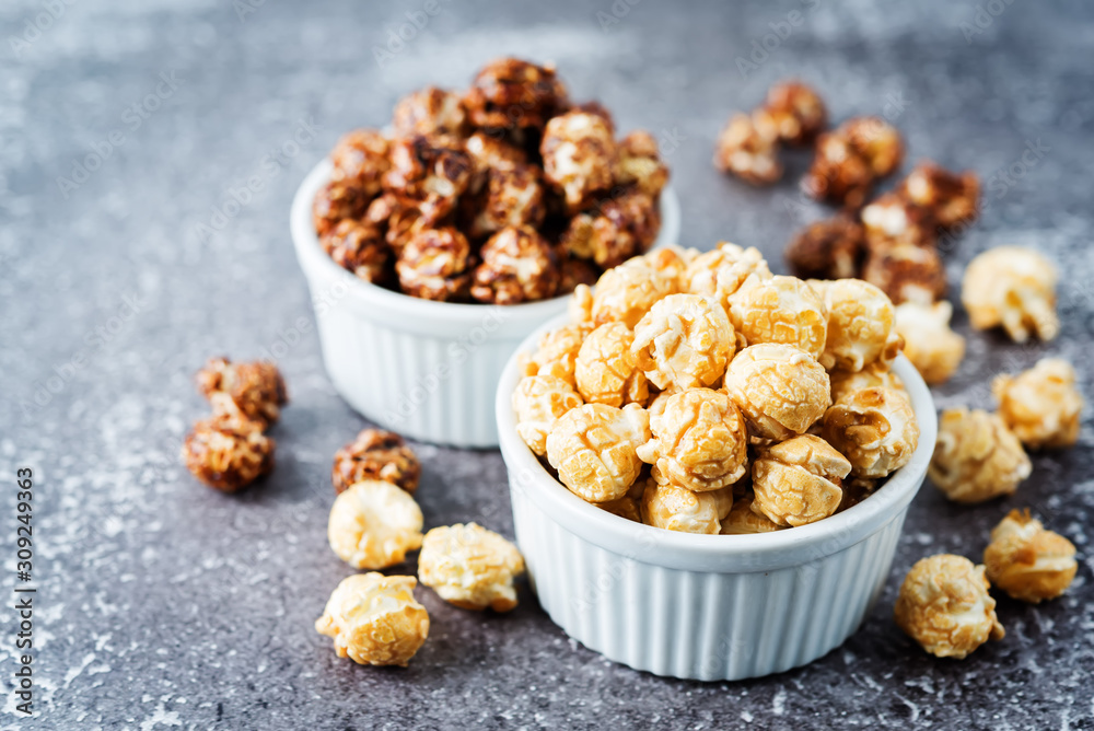 Caramel and chocolate sweet Popcorn in a white bowl Caramel and chocolate sweet Popcorn in a white bowl