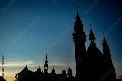 High contrast silhouettes. Summer evening street view from Grote Markt square of Aalst, Flanders, Belgium