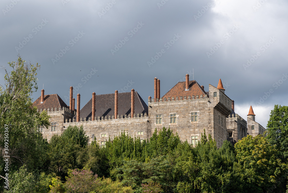 Exterior walls of the palace of the Dukes of Braganza in Guimaraes in northern Portugal Exterior walls of the palace of the Dukes of Braganza in Guimaraes in northern Portugal