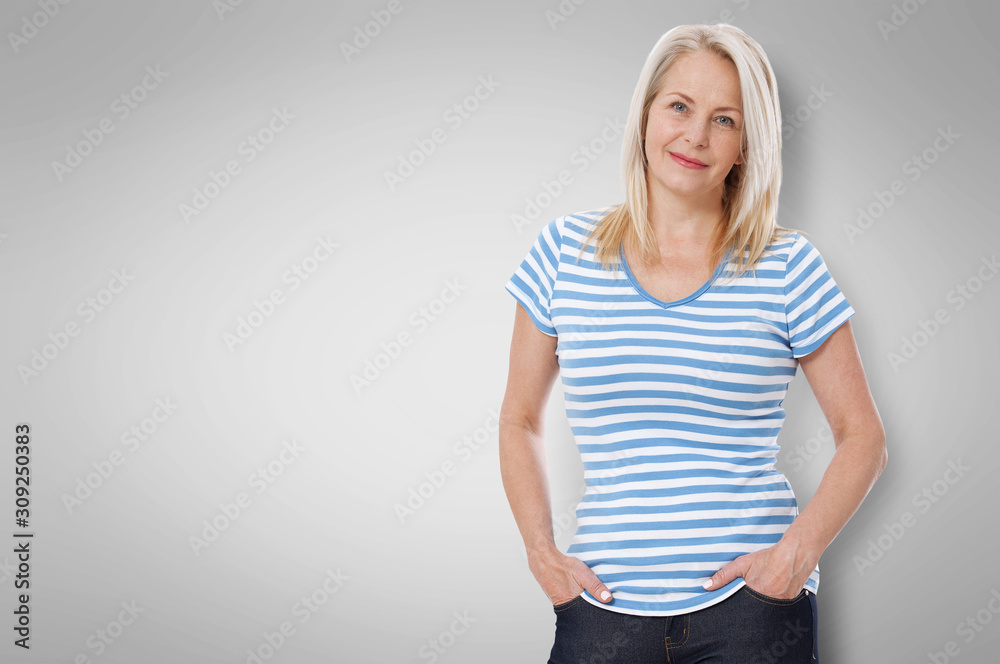 Friendly smiling middle-aged woman isolated on white background Friendly smiling middle-aged woman isolated on white background