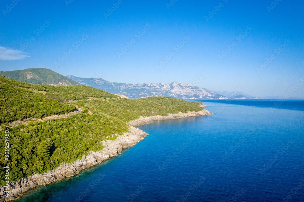 Aerial view of sea and fantastic Rocky coast, Montenegro. Shot from air.