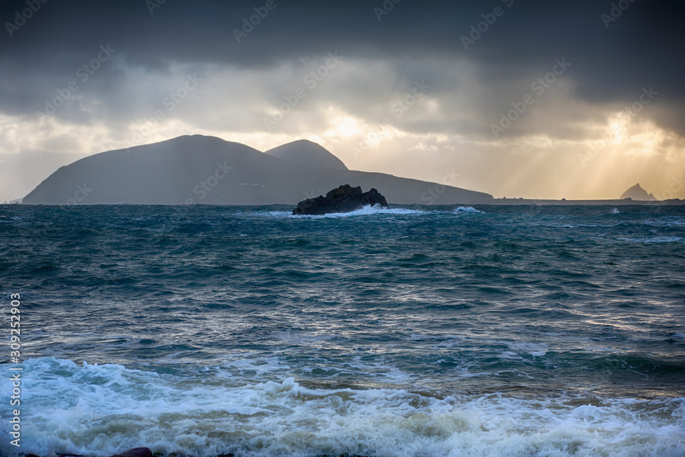 Rain moves in across the Great blasket island close to sunset
