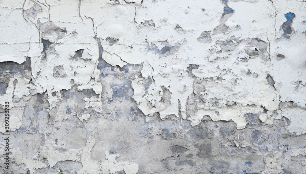 Cracked concrete grey wall covered with gray cement texture as background can be used in design. Dirty concrete texture with cracks and holes.