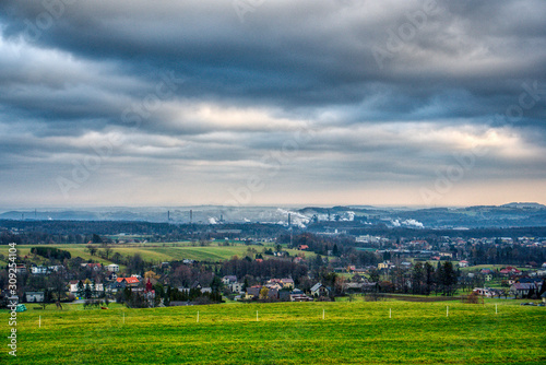 industrial valley with beautiful meadow and clouds, Trinec Czech