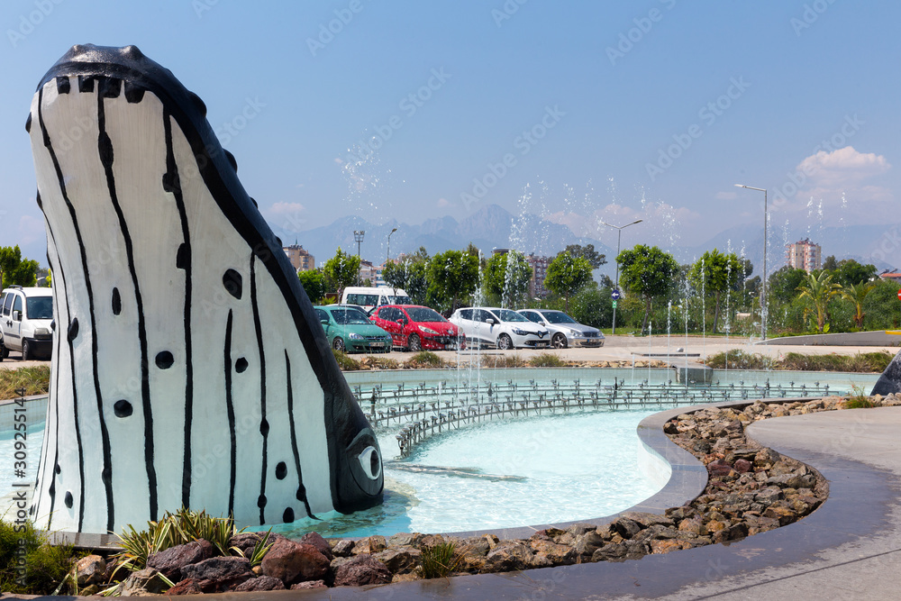 Keith emerges from the fountain in front of the aquarium. Opened in 2012, it's the longest